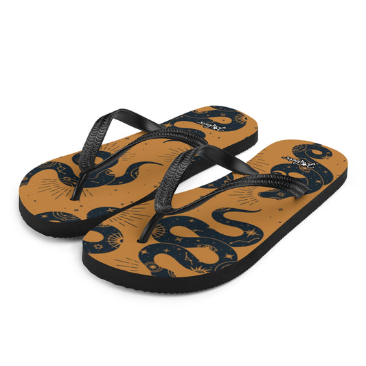 JERGHATS flip-flops with a tan base, black snake and celestial print, and black Y-shaped rubber straps.