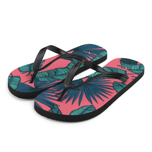 JERGHATS flip-flops featuring a pink and teal tropical leaf print, black rubber soles, and black Y-shaped straps.