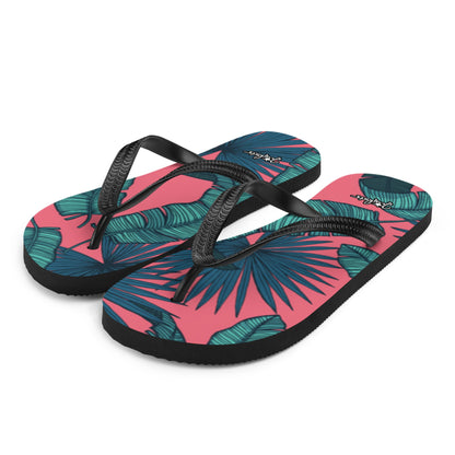 JERGHATS flip-flops featuring a pink and teal tropical leaf print, black rubber soles, and black Y-shaped straps.